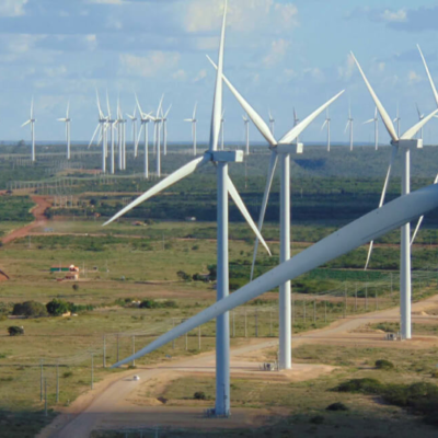 Image of a wind farm in the English countryside. Full service sustainable marketing agency.