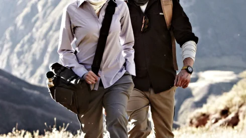 Craghoppers campaign image showing two people in the countryside walking in outdoor clothing. Part of personalised catalogue printing case study.