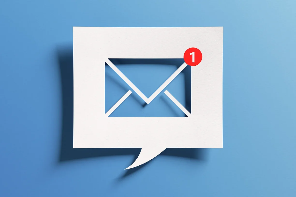 Blue envelope with a red notification represent email messages as part of an integrated marketing plan.