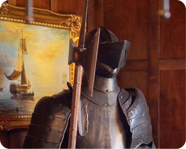 Image of a knights armour in a old manor.