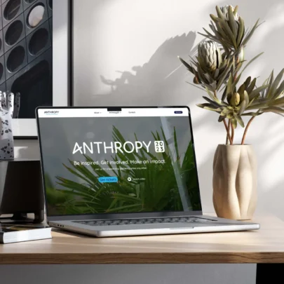 Anthropy's website shown on a laptop in an office - designed by Webmart