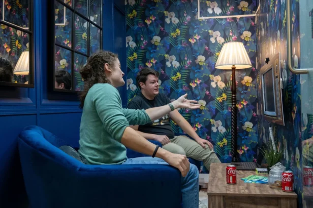 Two Webmarteers chat in the Lounge - one of the themed meeting rooms at the Webmart Head Office