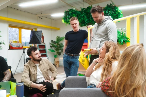 Image of the Webmart team in an internal meeting