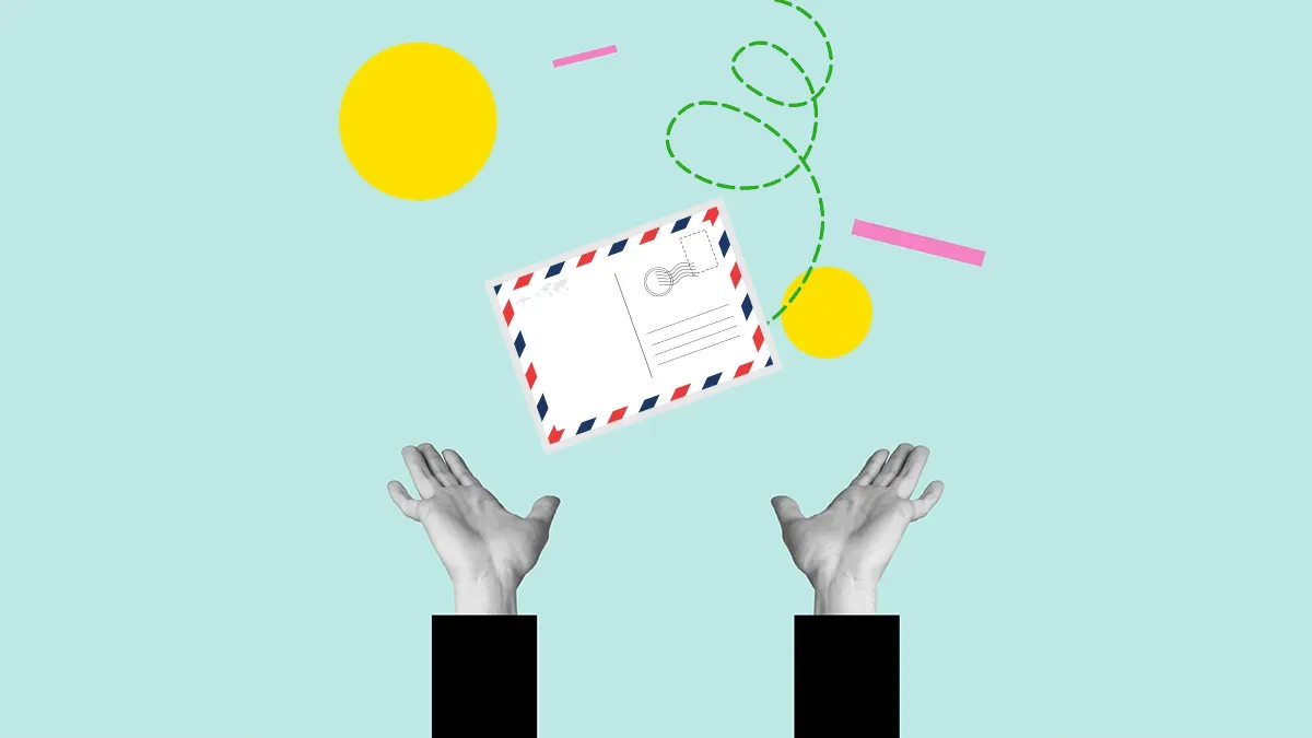 hands reach out to catch a falling direct mail postcard