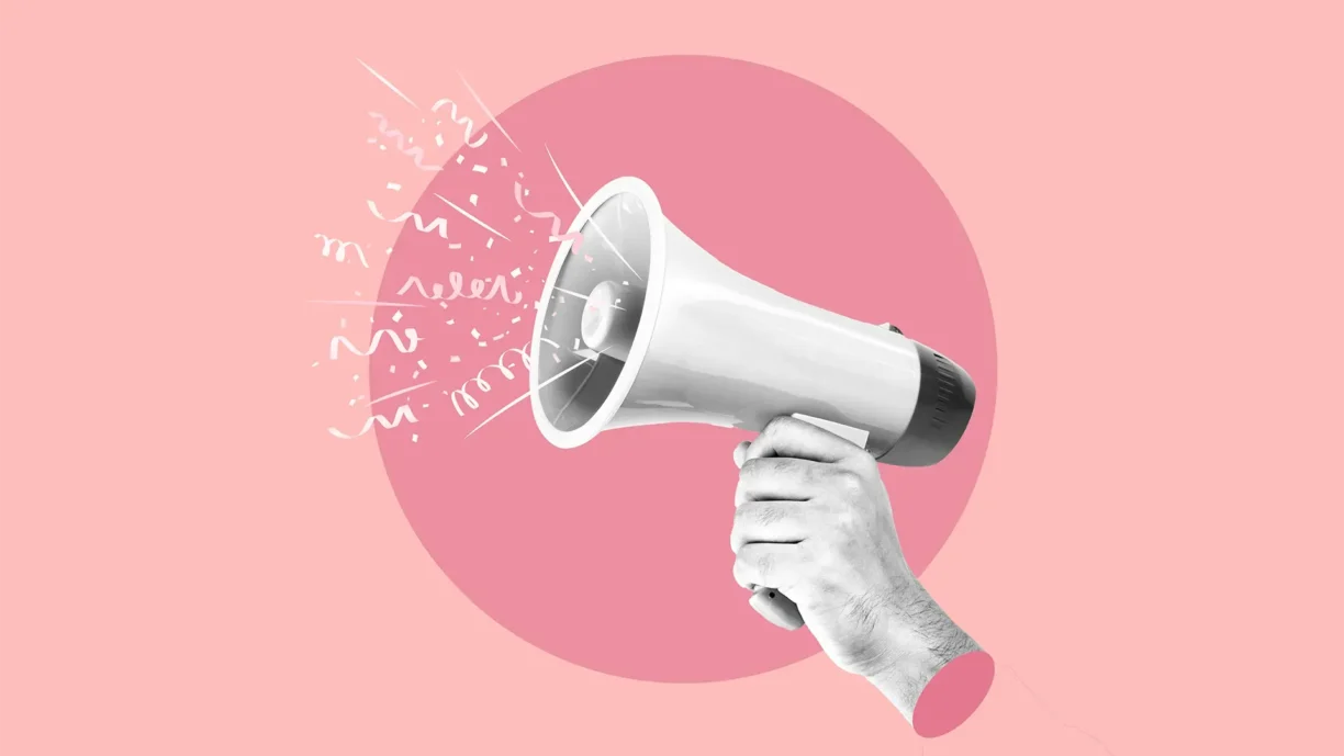 a hand holds a megaphone to represent responsive campaigns with print
