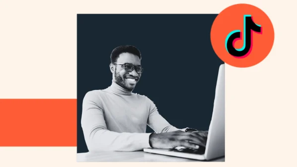 A man smiles as he learns about the new suite of AI tools available on TikTok's creators channel