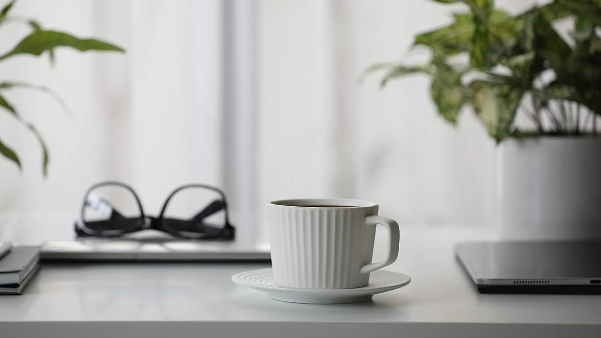 A white desk set up for working from home for millennials and gen z. Webmart's marketing expert insights.