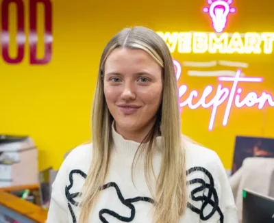 Milli Williams Webmart account manager in the famous Webmart yellow office | Fully integrated marketing agency services
