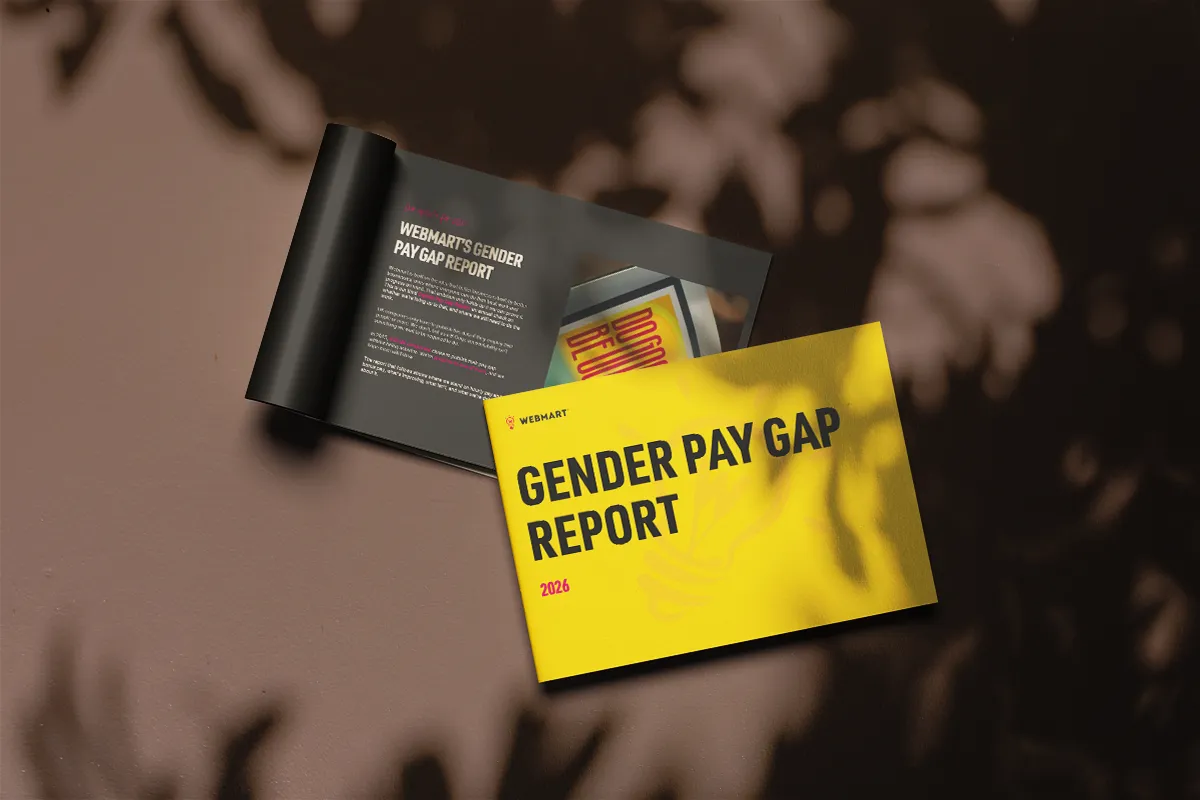 Webmart's 2026 Gender Pay Gap Report lays on a table background