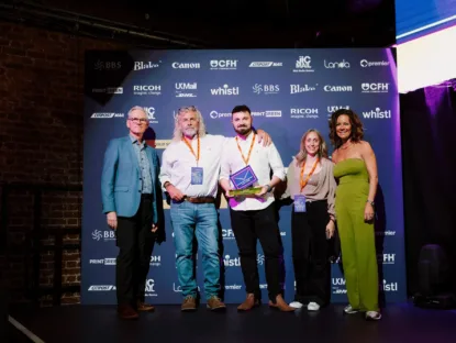 Webmart team Simon Biltcliffe, Tom Maskill and Kelly OSullivan collecting the gold award for sustainable campaign at the SMP Awards 2026